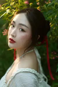 Elegant Woman in White Dress Amidst Lush Green Nature-5