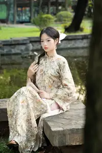East Asian Traditional Beauty: Gentle Young Woman in Ao Dai with Elegant Wooden Fan-5