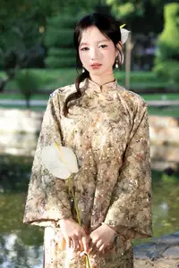 East Asian Traditional Beauty: Gentle Young Woman in Ao Dai with Elegant Wooden Fan-4