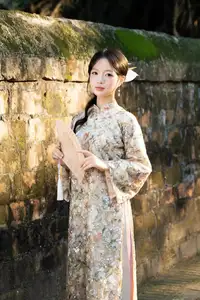 East Asian Traditional Beauty: Gentle Young Woman in Ao Dai with Elegant Wooden Fan-10