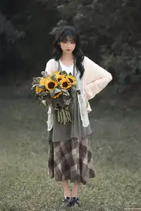Youthful Beauty: A Gentle Girl Embracing Radiant Sunflowers-2