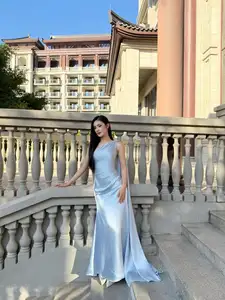 Miss Ý Nhi Radiates Elegance: A Vision in Her Sophisticated Evening Gown on Grand Ancient Stairs-0