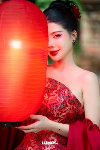 Traditional Vietnamese Beauty: Elegant Woman with Red Lantern, Capturing Asian Charm. 1000018929.jpg-2
