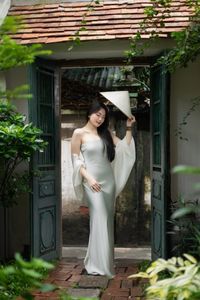 Graceful Vietnamese Girl in Traditional Conical Hat-2