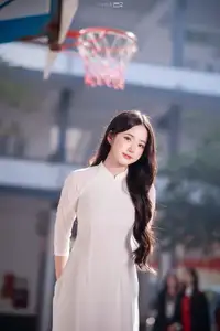 Discover the Grace of White Ao Dai: Vietnamese Girl's Delicate Beauty Shines-4