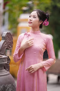 VGU No.136: The Graceful Pink Ao Dai: Vietnamese Beauty Embracing Tradition and Serenity-16