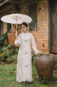 XVG No.29: Graceful Ao Dai - Unveiling the Serene Beauty of a Vietnamese Woman with Golden Blooms.-8