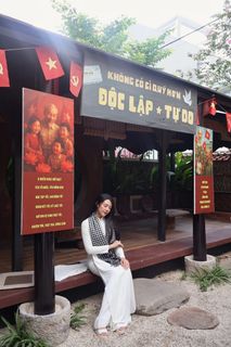 Elegant Vietnamese Woman in White Ao Dai Embracing Spirit of Independence-5