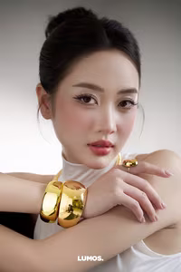 VGU No.53: Elegant beauty in a pristine white dress, posing glamorously on a luxurious black chair. Explore the sophisticated style of the modern woman.-3