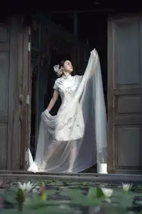 Timeless Grace: Vietnamese Woman in Modernized Ao Dai by a Serene Lotus Pond-6