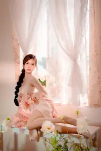 Ethereal Beauty: A Young Woman's Delicate Charm in a Flowing Pink Dress-20