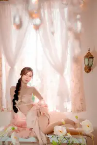 Ethereal Beauty: A Young Woman's Delicate Charm in a Flowing Pink Dress-17