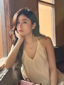 Natural Beauty: Serene Portrait of a Young Woman in Warm Sunlight-5