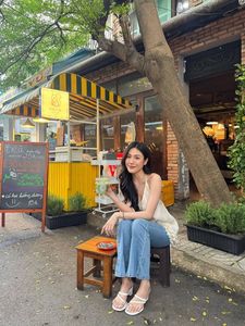 Natural Beauty: Serene Portrait of a Young Woman in Warm Sunlight-3