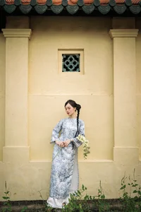Timeless Grace in Blue Floral Ao Dai and Ancient Architecture-6