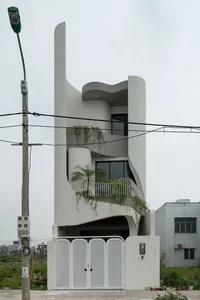 Stunning Modern Architecture: Explore This Innovative Curved Tube House Design in Da Nang, Vietnam for Ultimate Minimalist Living Inspiration-1