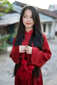 Elegant Vietnamese Beauty in Red Ao Dai: A Glimpse into Traditional Grace-11