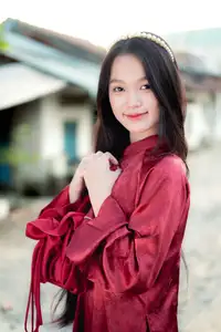 Elegant Vietnamese Beauty in Red Ao Dai: A Glimpse into Traditional Grace-3