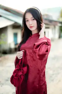 Elegant Vietnamese Beauty in Red Ao Dai: A Glimpse into Traditional Grace-1