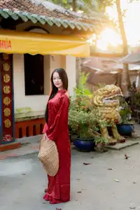 Elegant Vietnamese Beauty in Red Ao Dai: A Glimpse into Traditional Grace-4
