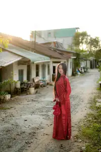 Elegant Vietnamese Beauty in Red Ao Dai: A Glimpse into Traditional Grace-10