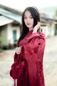 Elegant Vietnamese Beauty in Red Ao Dai: A Glimpse into Traditional Grace-2