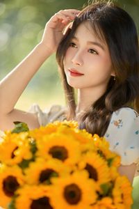 Charming Beauty with Sunflowers in a Natural Landscape-3