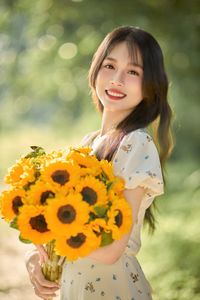 Charming Beauty with Sunflowers in a Natural Landscape-5