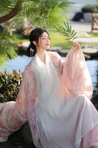 Explore East Asian Traditional Beauty: An Elegant Muse in Soft Pastel Attire.-10