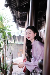 Ethereal Grace in Lavender Ao Dai Amidst Ancient Architecture-0