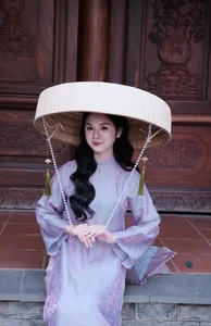Ethereal Grace in Lavender Ao Dai Amidst Ancient Architecture-8
