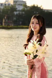 Gentle Vietnamese Beauty: Pink Ao Dai by the Lake, with Pure Lilies-5
