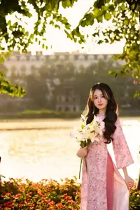 Gentle Vietnamese Beauty: Pink Ao Dai by the Lake, with Pure Lilies-17