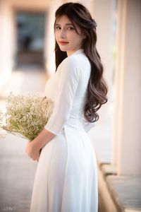 Graceful Vietnamese Girl in Pristine White Ao Dai: Timeless Beauty.-2