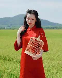 Discover the Serene Beauty: Vietnamese Girl in Red Ao Dai Amidst Green Rice Fields-3