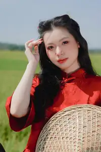 Discover the Serene Beauty: Vietnamese Girl in Red Ao Dai Amidst Green Rice Fields-0