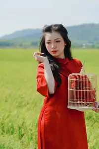 Discover the Serene Beauty: Vietnamese Girl in Red Ao Dai Amidst Green Rice Fields-20