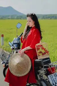 Discover the Serene Beauty: Vietnamese Girl in Red Ao Dai Amidst Green Rice Fields-18