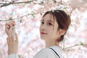 Spring Muse: Pure Elegance in JK Uniform Amidst Blossoms-19