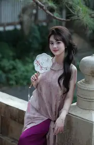 Enchanting Vietnamese Beauty: A Graceful Portrait in Modern Traditional Dress and Fan-6