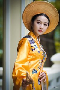 Traditional Vietnamese Beauty: Elegant Lady in Royal Attire & Conical Hat-2