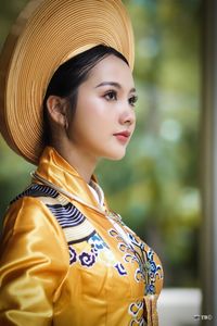 Traditional Vietnamese Beauty: Elegant Lady in Royal Attire & Conical Hat-3
