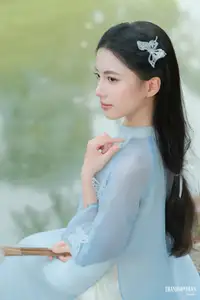Elegant Vietnamese Maiden in Áo Dài Amidst Serene Nature's Embrace-6