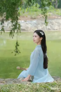 Elegant Vietnamese Maiden in Áo Dài Amidst Serene Nature's Embrace-7