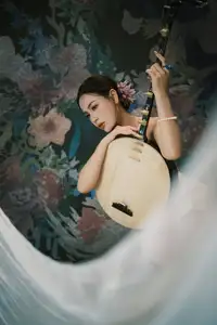 Discover Vietnamese Grace: An Elegant Girl in Ao Yem with a Red Fan.-3