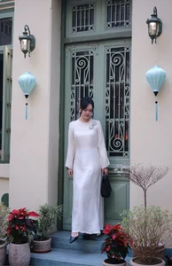 MC Thao Trang Embraces Tradition: Stunning Vietnamese Ao Dai Photoshoot for Tet Lunar New Year Celebrations-0