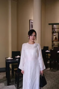 MC Thao Trang Embraces Tradition: Stunning Vietnamese Ao Dai Photoshoot for Tet Lunar New Year Celebrations-3