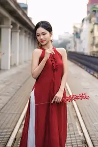 Gentle Vietnamese Girl in Red by Old Railway Bridge: Elegant Asian Beauty-3
