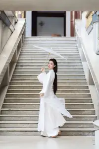 Serene Vietnamese Beauty: A Gentle Muse in White with Pink Lilies-4