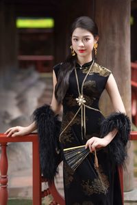 Captivating Asian Beauty in an Elegant Black Velvet Cheongsam-1